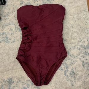 Adorable one piece swimsuit, with cut outs on the side